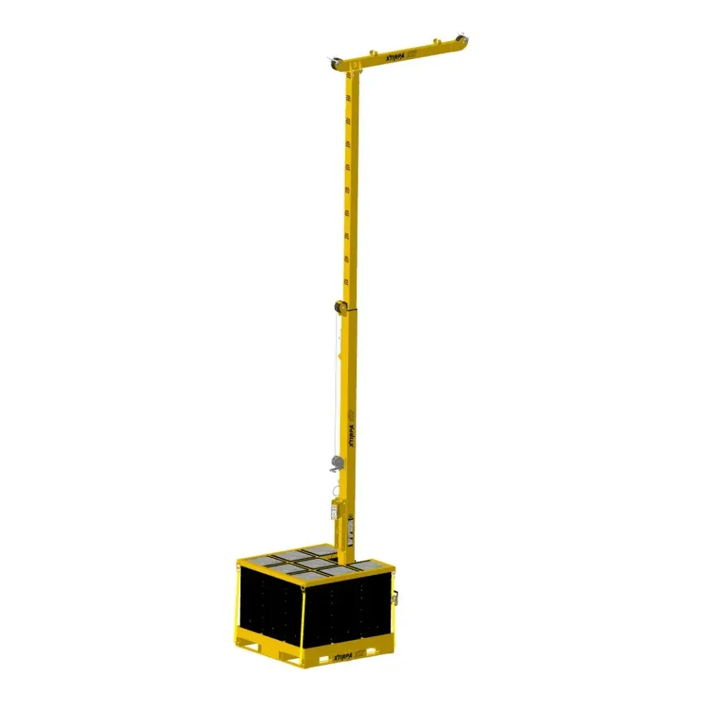 Potence mobile SpanSet XLT jaune, mât et bras sur une base lestée de blocs de béton